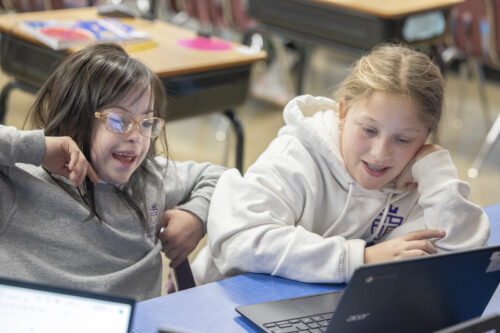 Students with special needs in Catholic schools
Two students work on a project.