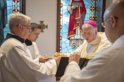 Instituted acolytes Salvador Alatorre and Jonathan Klimpel