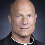 Father Larry T. Huber obituary