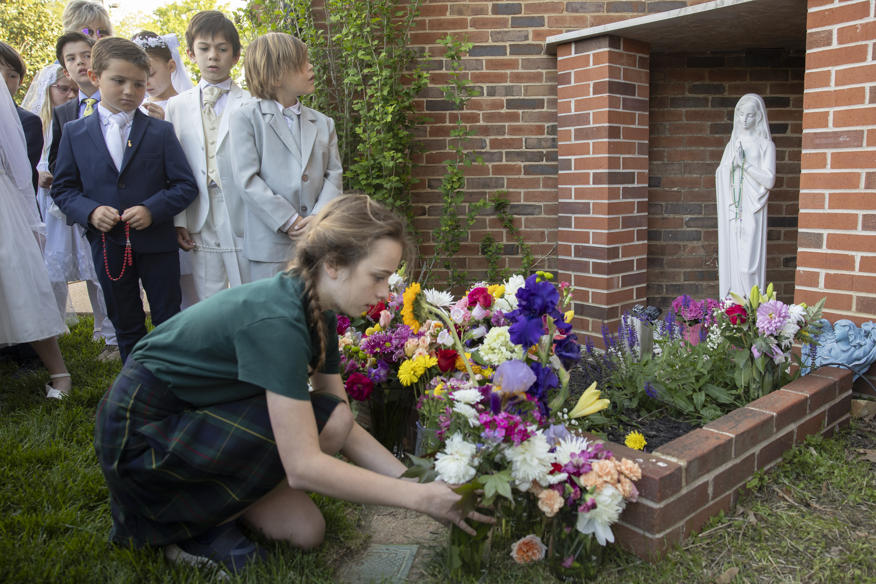 St. Austin School students crown Mary, queen and mother