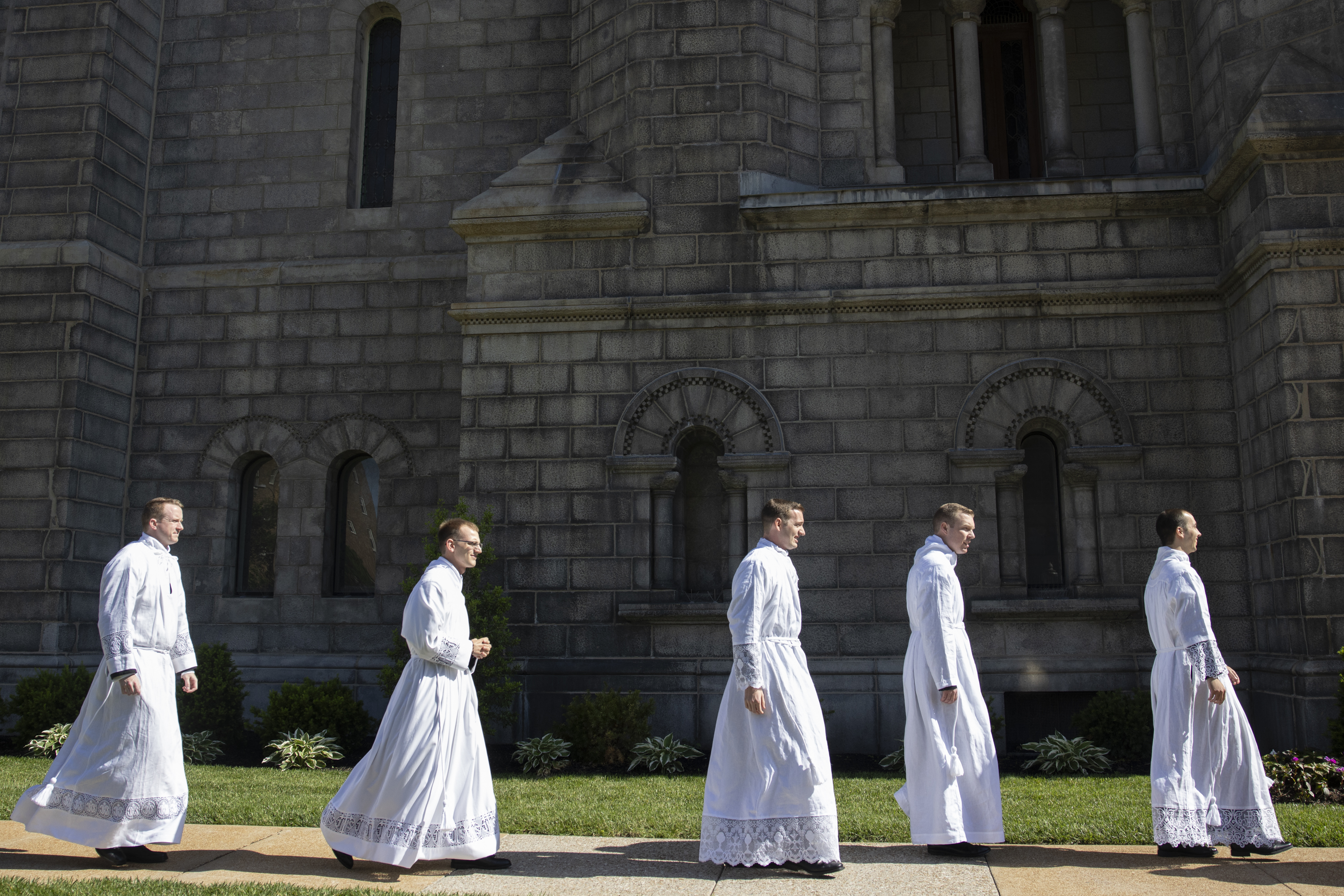 Seminarians processed to the Cathedral Basilica of Saint Louis for their ordination to the transitional diaconate.