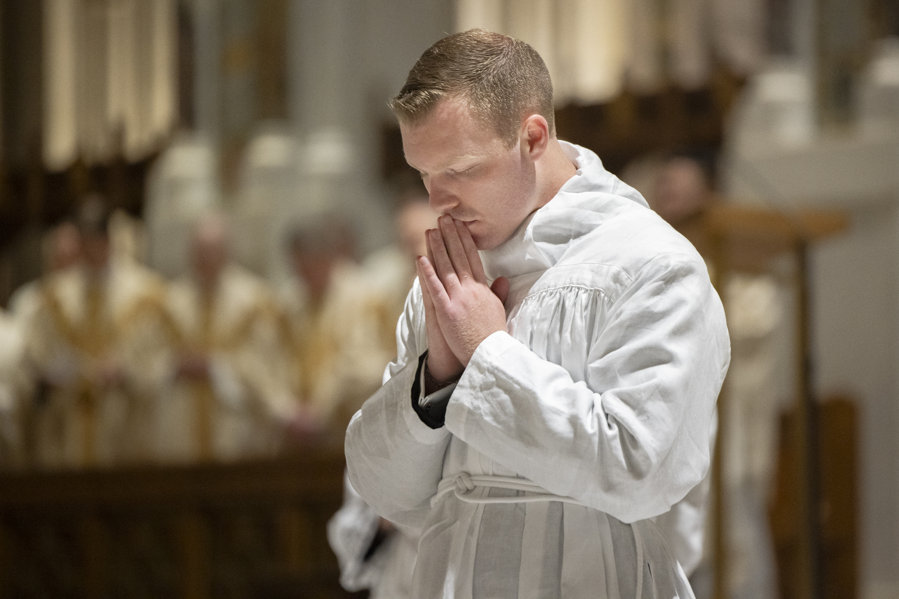 Alex Cammarata prayed during the rite of ordination.