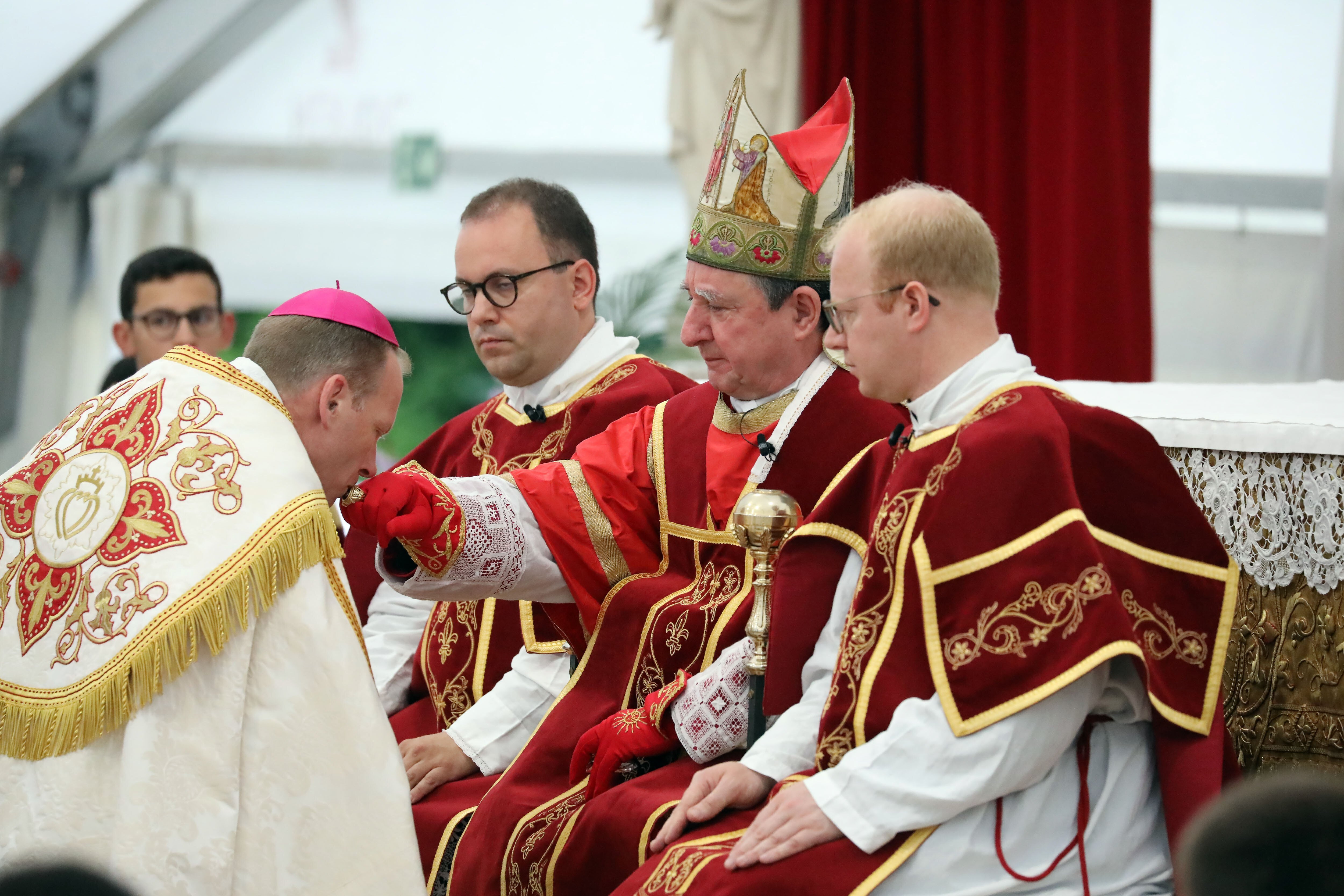 Newly consecrated Society of St. Pius X bishop during a SSPX liturgical celebration.