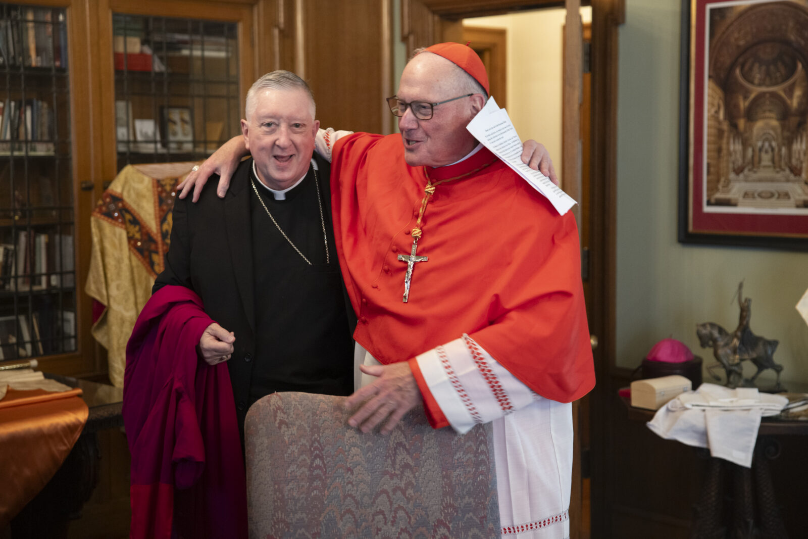 Archbishop Mitchell T. Rozanski greeted Cardinal Timothy Dolan before a Mass for the Bicentennial Jubilee Year