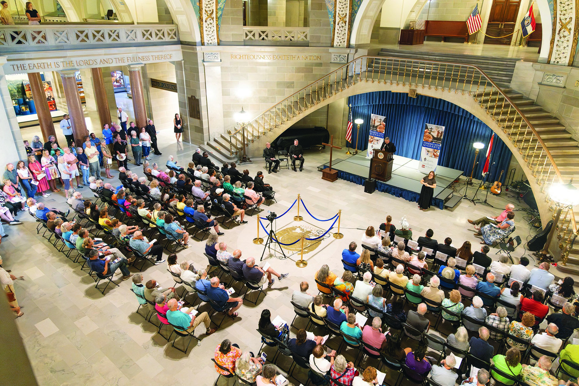 Prayers for migrants, immigrants, refugees echo through Missouri Capitol’s rotunda